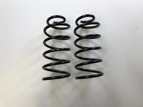 NEU Satz Fahrwerksfedern Achse vorne links rechts KZ Lila Original Opel Astra F