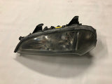 NEU NOS Frontscheinwerfer vorne links Rechtslenker Valeo Orig Vauxhall Tigra A