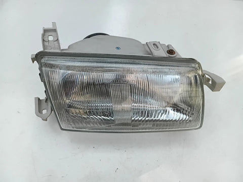 NEU NOS Frontscheinwerfer vorne rechts KZ XJ Carello Original Opel Astra F