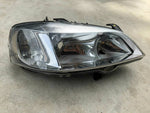 Frontscheinwerfer rechts KZ DW Original Hella für Opel Astra G Rechtslenker
