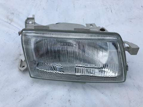 NEU Scheinwerfer Frontscheinwerfer vorne rechts XQ Carello Original Opel Astra F